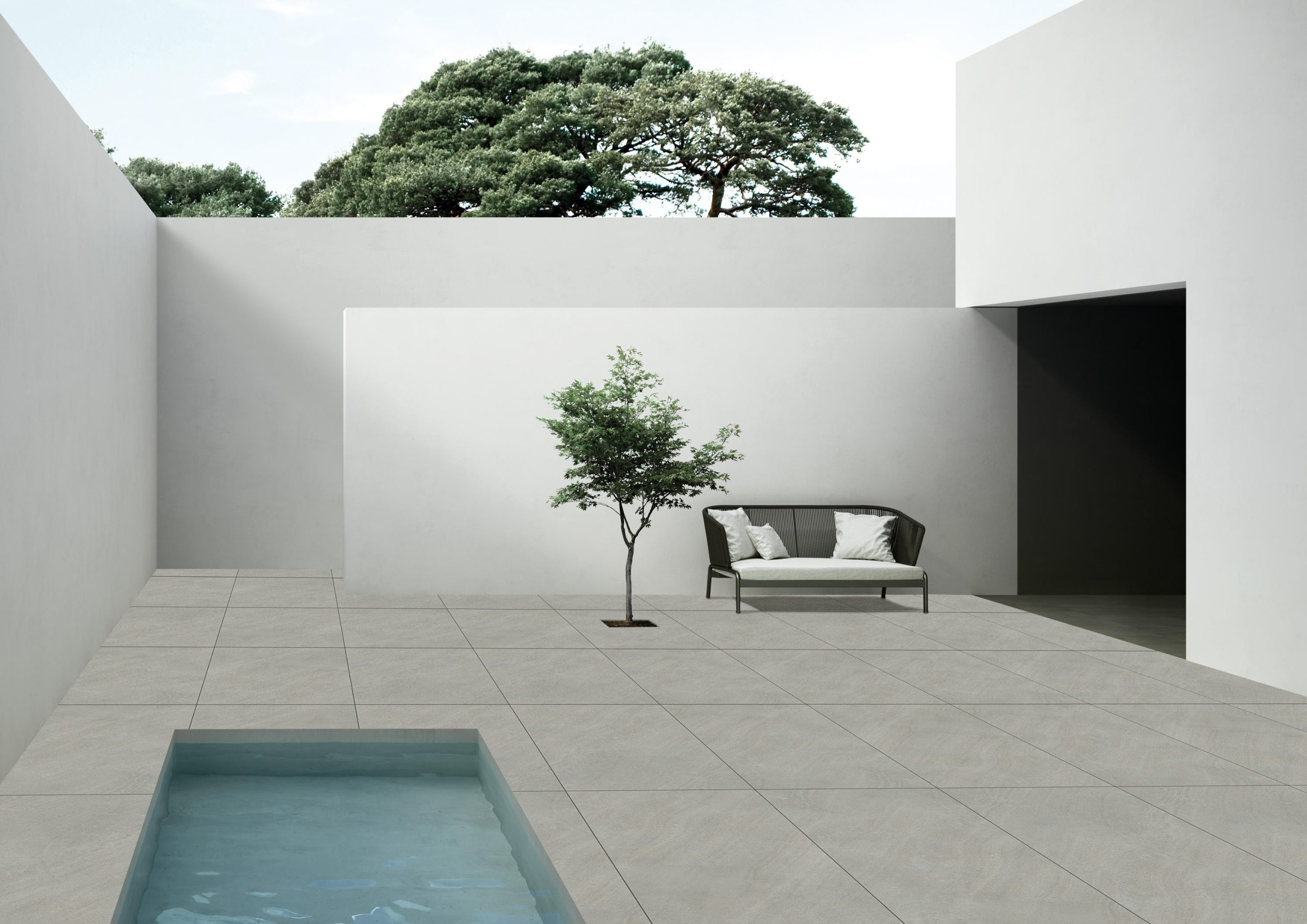 Grey outdoor porcelain tiles on a patio