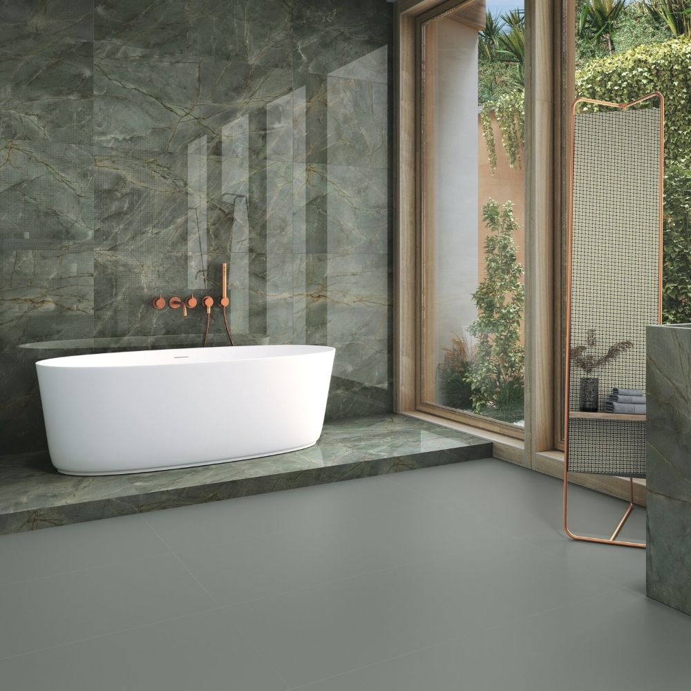 Green marble effect porcelain tiles in a boutique bathroom