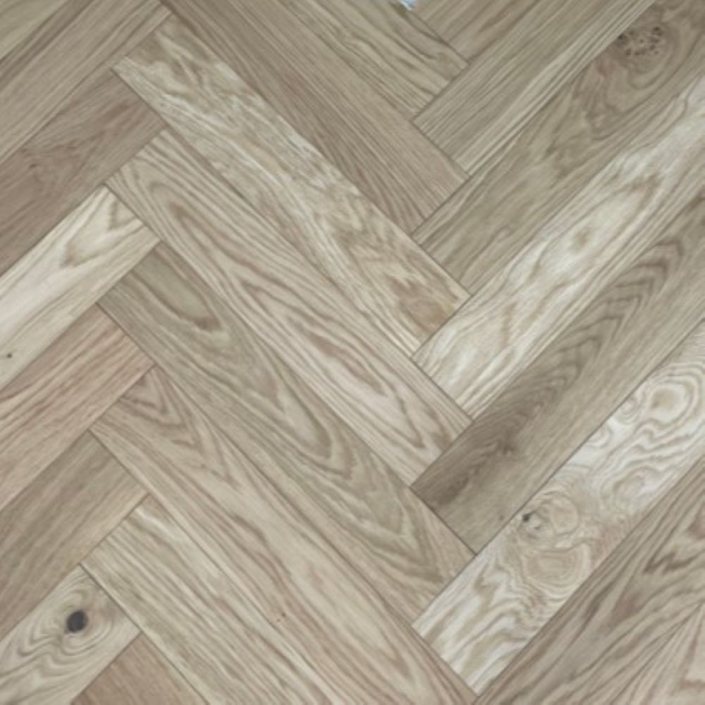 Natural oak herringbone parquet flooring detail