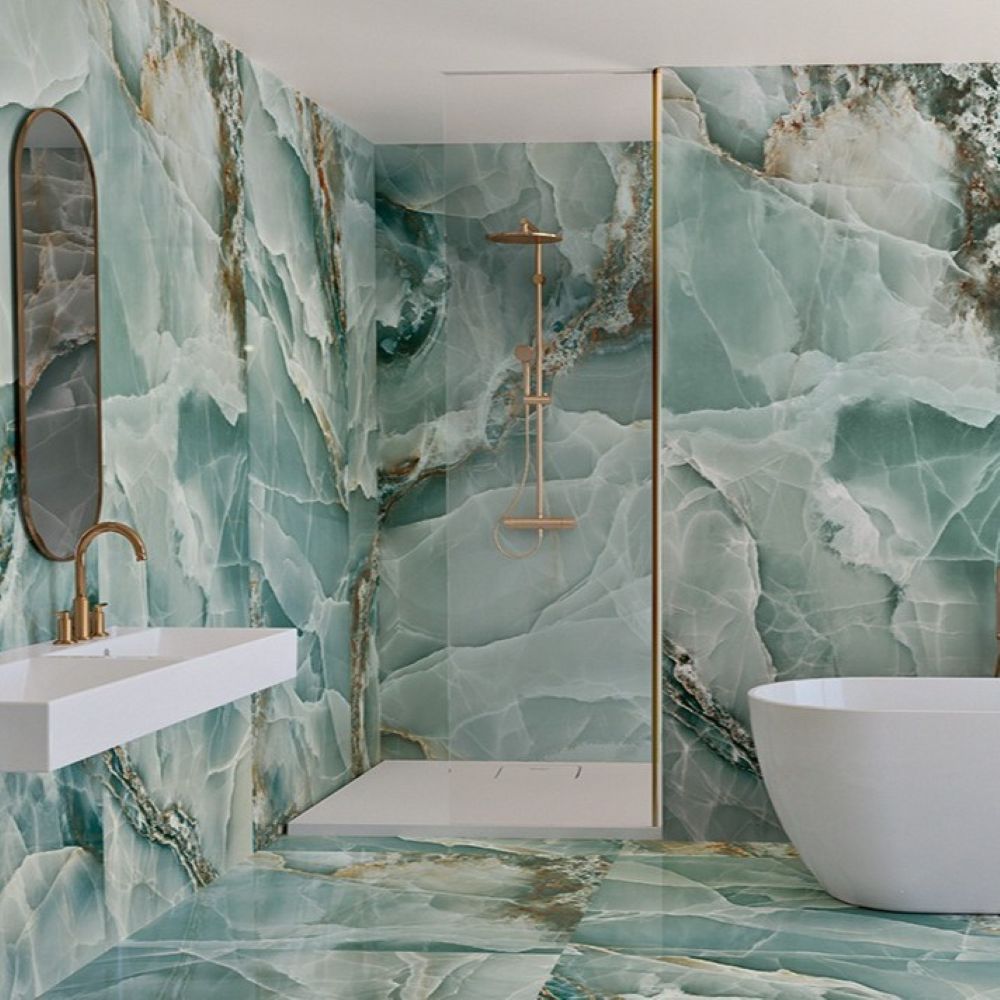 Turquoise onyx effect porcelain tiles in a bathroom