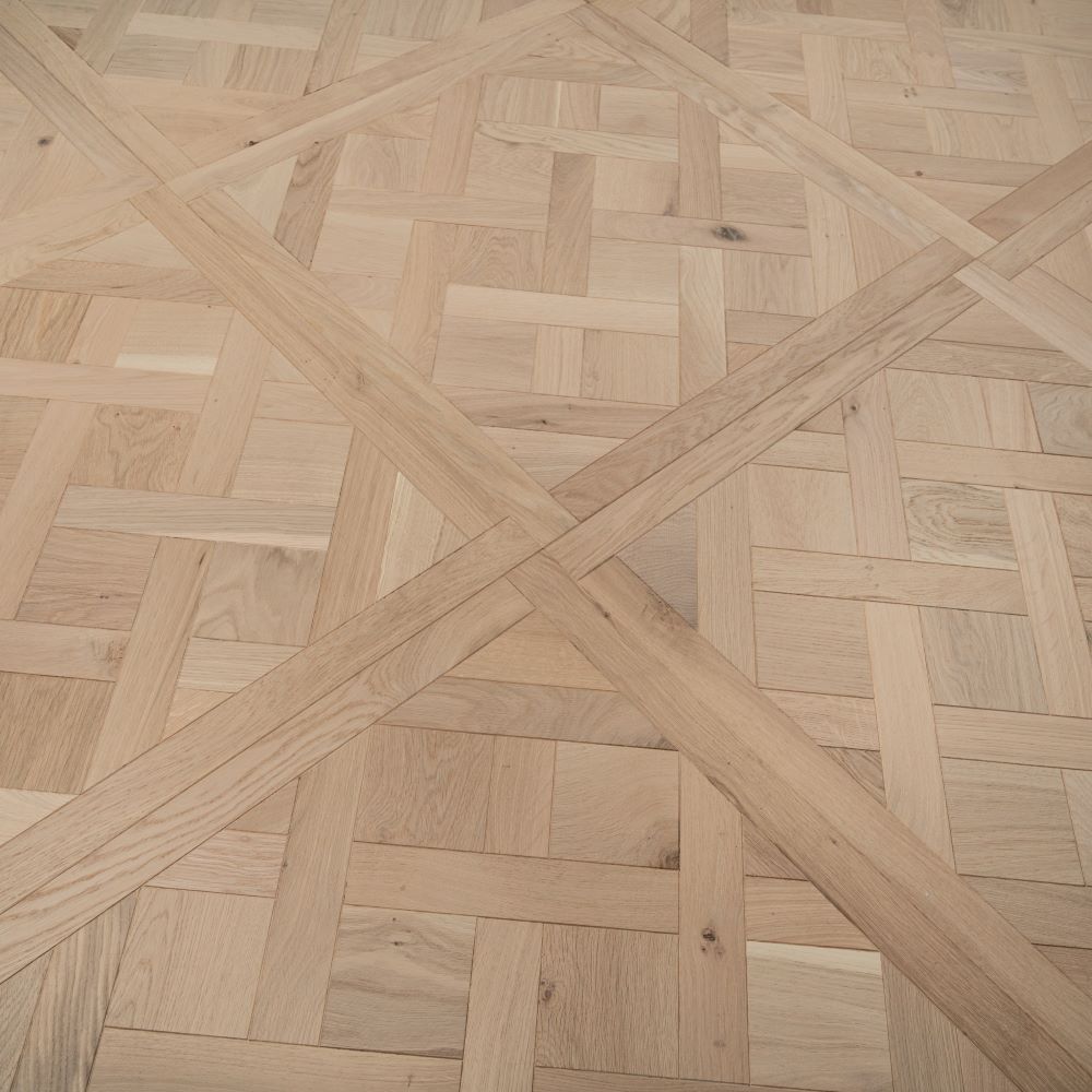 Engineered wood herringbone flooring in a bright interior