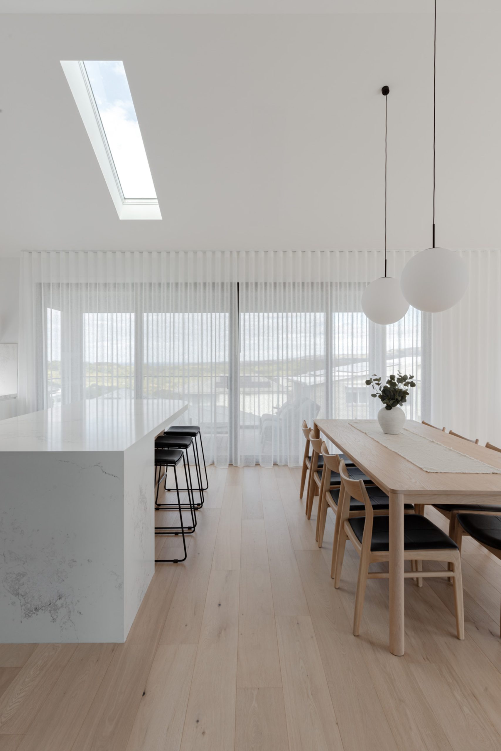 Open-plan home with coordinated premium vinyl flooring throughout