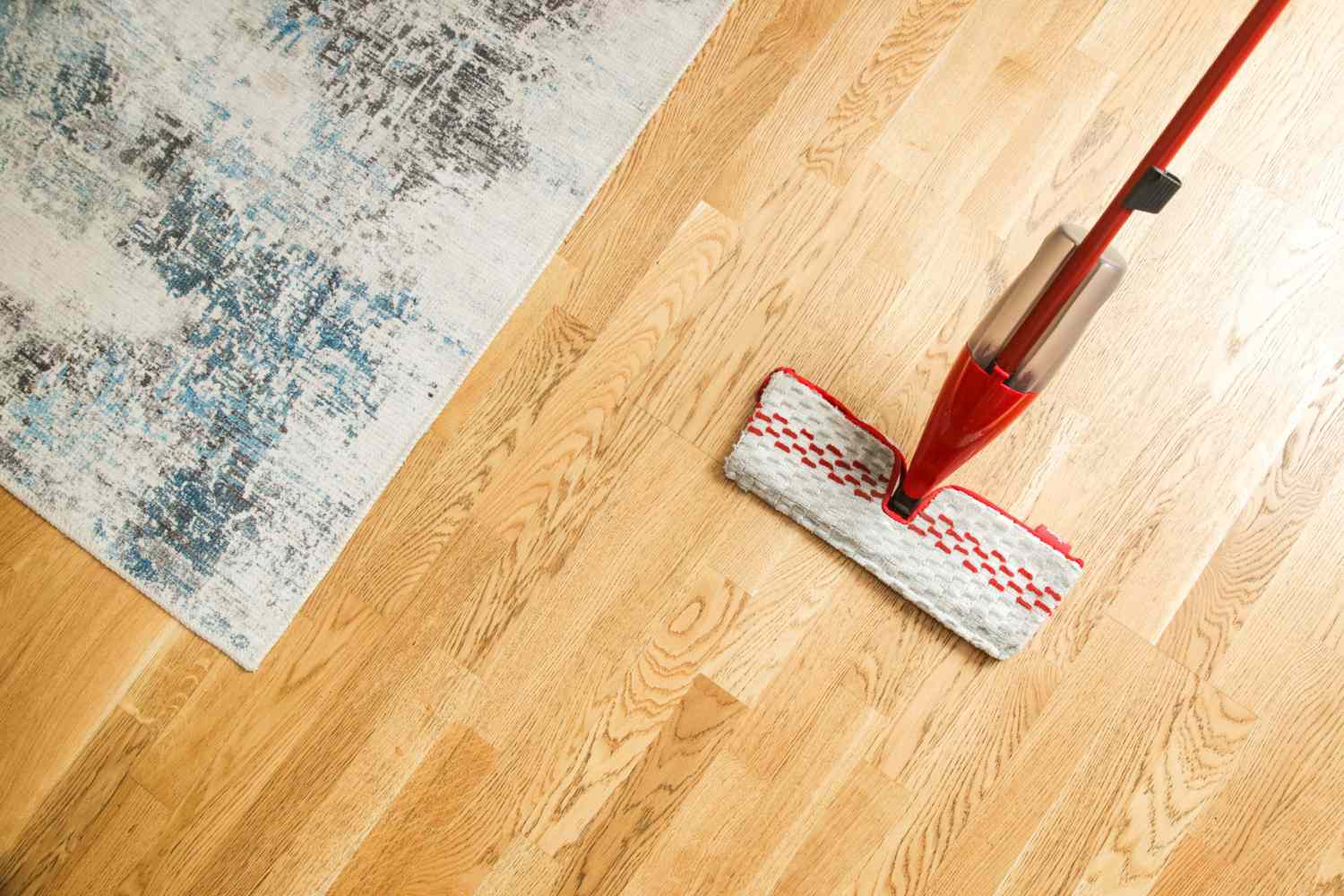 Cleaning engineered wood flooring with a soft microfibre mop