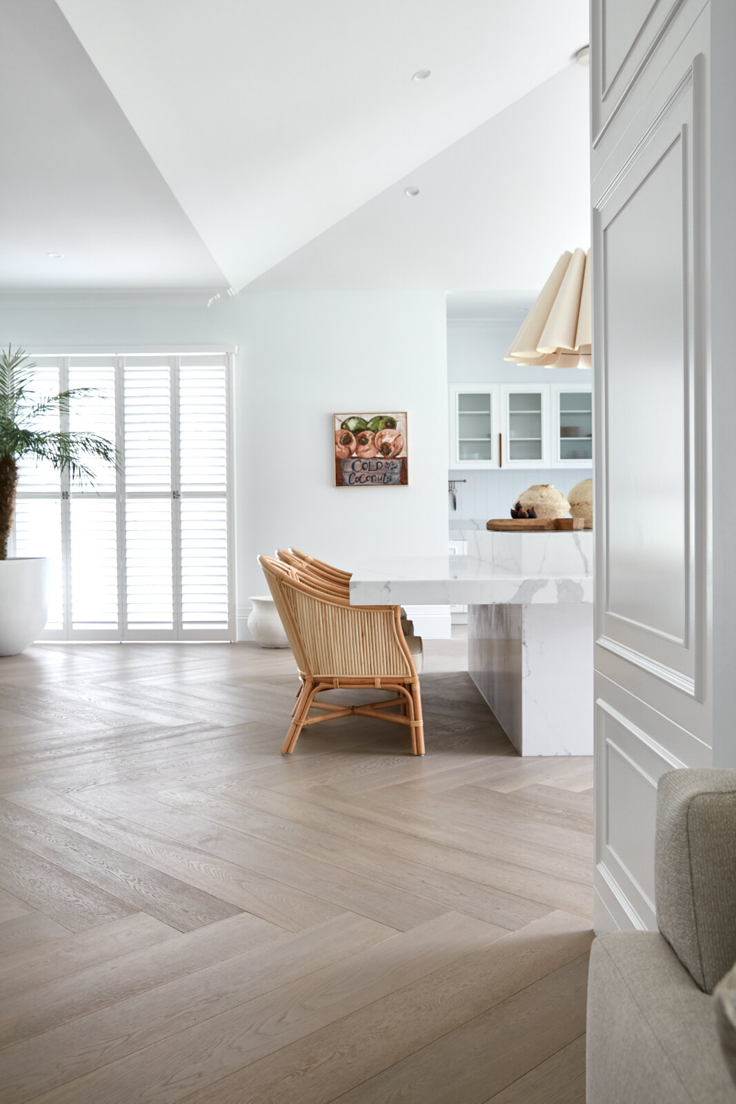 Modern room with light oak herringbone flooring